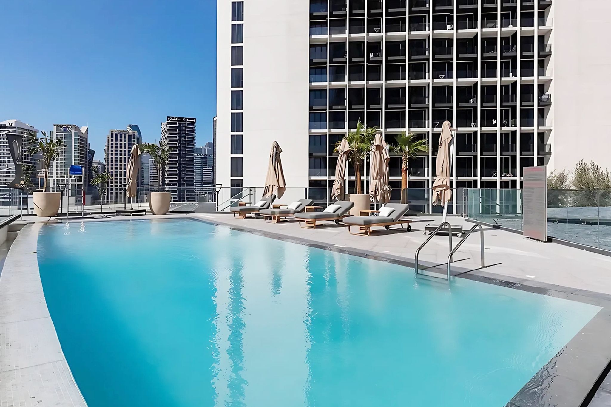 ELIVAAS Curated Centrally Located 1BR Near DubaiCanal and Do - Tap to explore photos