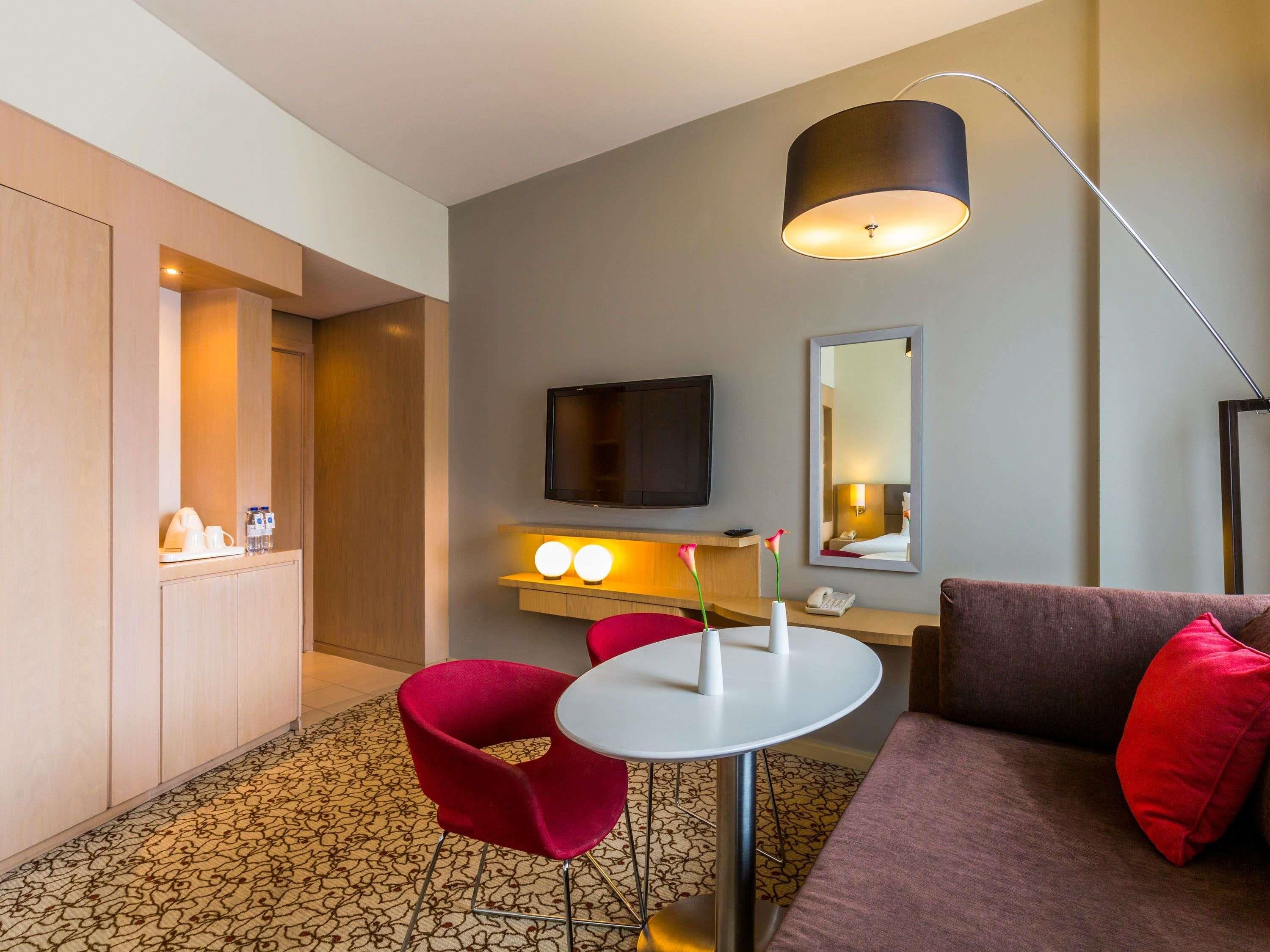 Novotel Suites Mall Avenue Dubai - Tap to explore photos