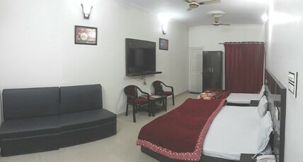 Landmark Hotel Dudhwa Room Type - Executive Suite Triple Bed With Balcony Landmark Hotel Dudhwa Room Type - Executive Suite Triple Bed With Balcony