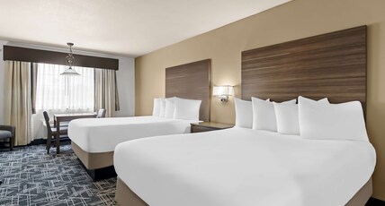 Best Western Plus Caldwell Inn & Suites Room Type - Suite - 4 Queen Beds, Non-Smoking, Family Room, 2 Flat Screen Tvs, Microwave And Refrigerator, Wi-Fi
