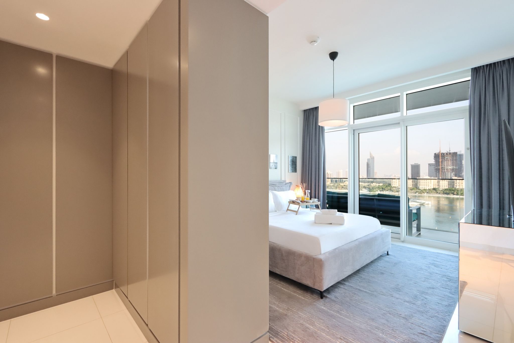 ELIVAAS Curated 2BR Beachfront Living, Stunning Marina Views - Tap to explore photos