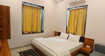 Trinetra resedency Room Type - Deluxe Luxury AC Bedroom