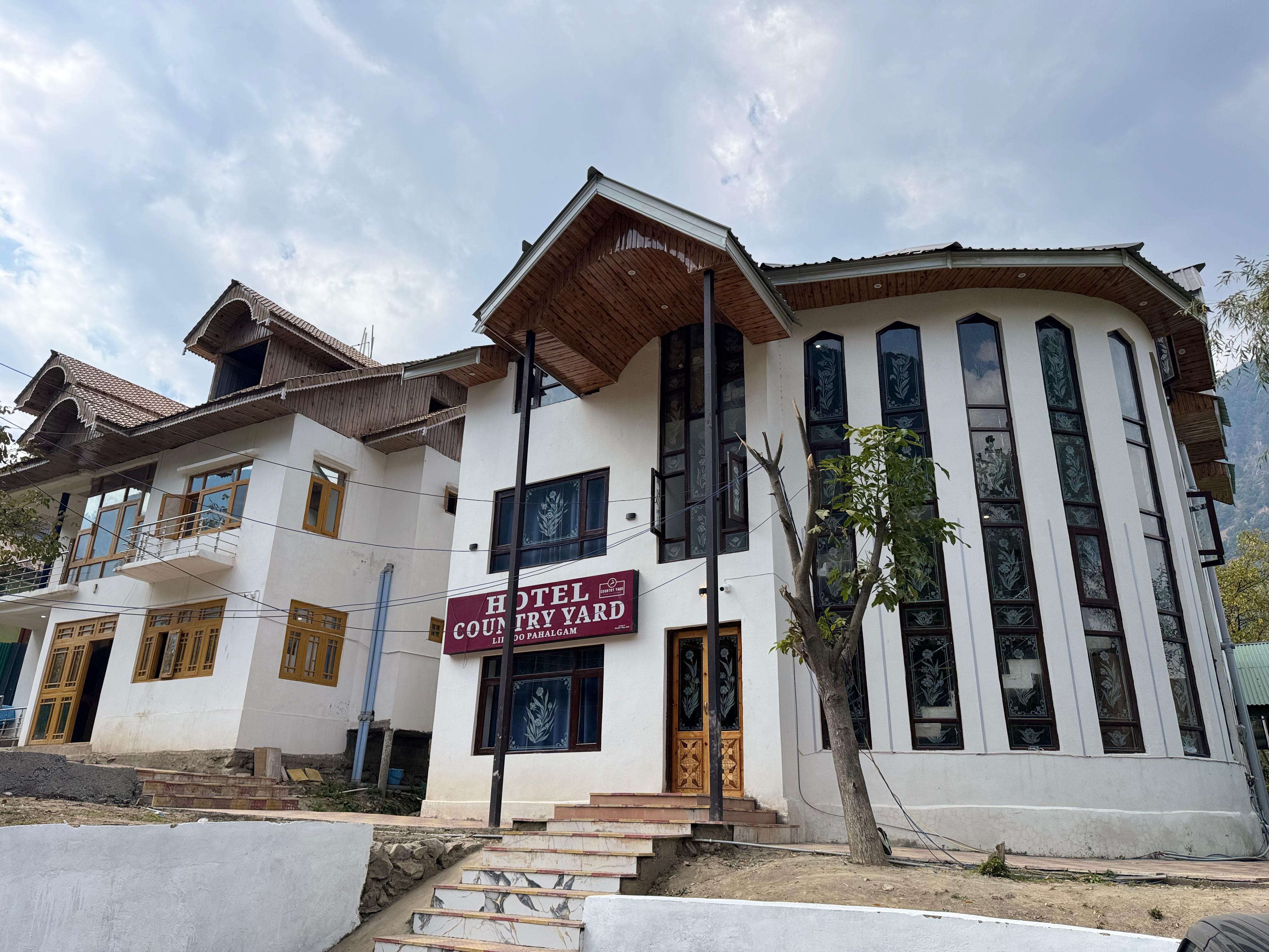 HOTEL COUNTRY YARD - Tap to explore photos