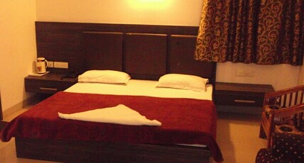 Hotel Heera Celebration Room Type - Deluxe Room