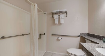 Best Western Butch Cassidy Inn Room Type - ACCESSIBLE - 1 KING,MOBILITY ACCESSIBLE,WALK IN SHOWER,NSMK,FULL BREAKFAST Best Western Butch Cassidy Inn Room Type - ACCESSIBLE - 1 KING,MOBILITY ACCESSIBLE,WALK IN SHOWER,NSMK,FULL BREAKFAST