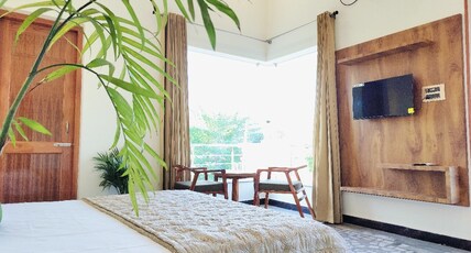THE Hidden Leaf Homestay Room Type - super deluxe room with balcony and mountain view