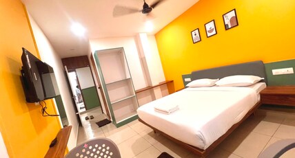 Cozy Rooms & Dormitory near KSRTC Stand Room Type - Standard Room Non AC