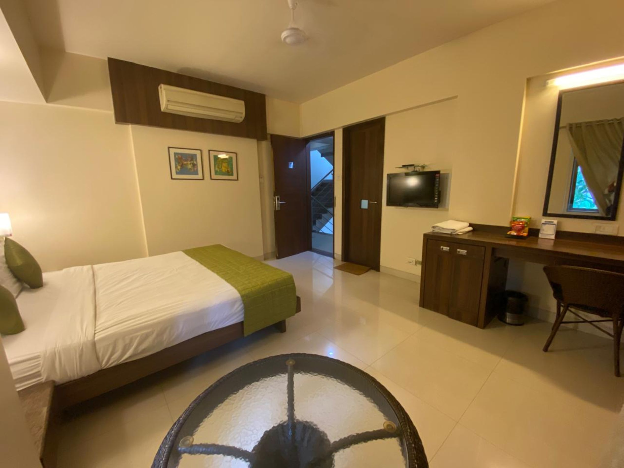 Hotel The Moneta (Near FC College) - Tap to explore photos