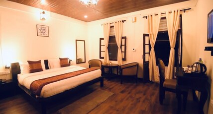 HOTEL MANOHAR MANOR Room Type - Four bed deluxe room with hill view