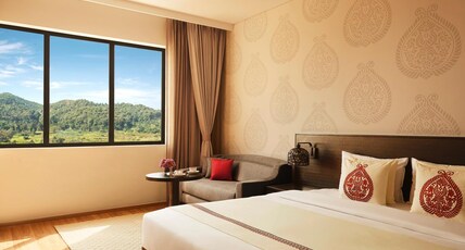Vivanta Guwahati Room Type - Premium Suite Hill View King bed with complimentary one way airport transfer Vivanta Guwahati Room Type - Premium Suite Hill View King bed with complimentary one way airport transfer