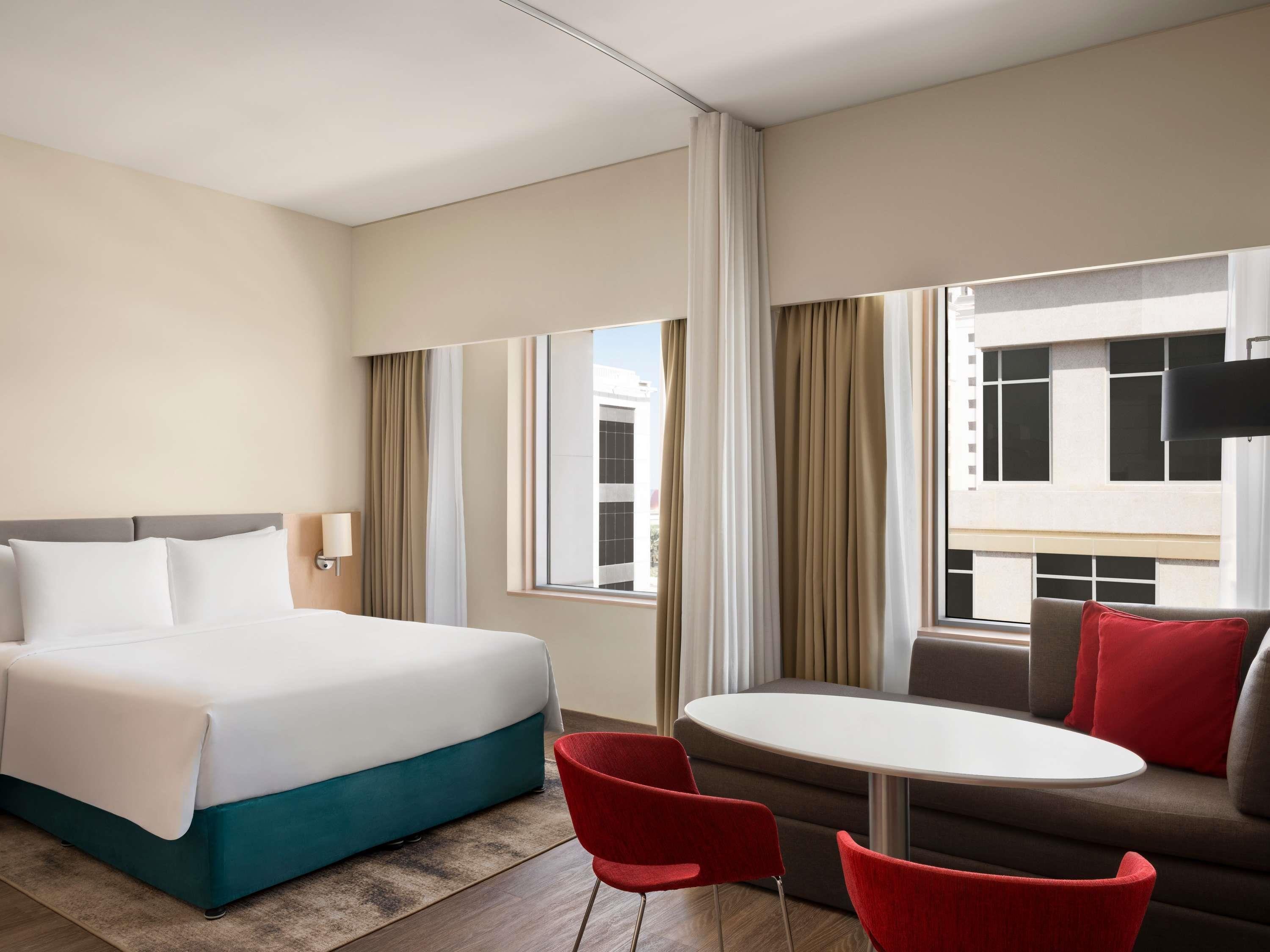 Novotel Suites Mall Avenue Dubai - Tap to explore photos