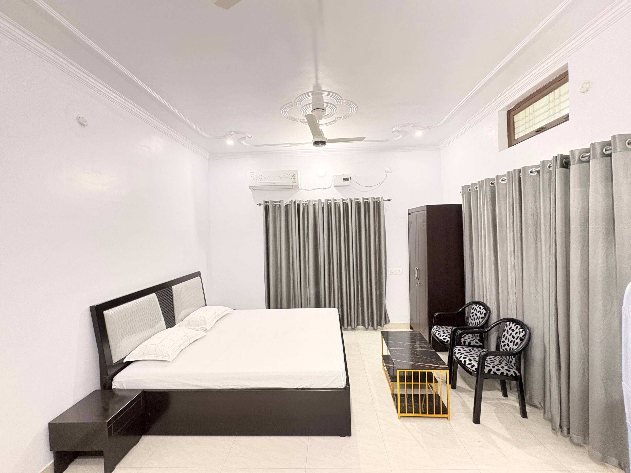 The Wings Home 2 BHK Sweet Deluxe - Tap to explore photos
