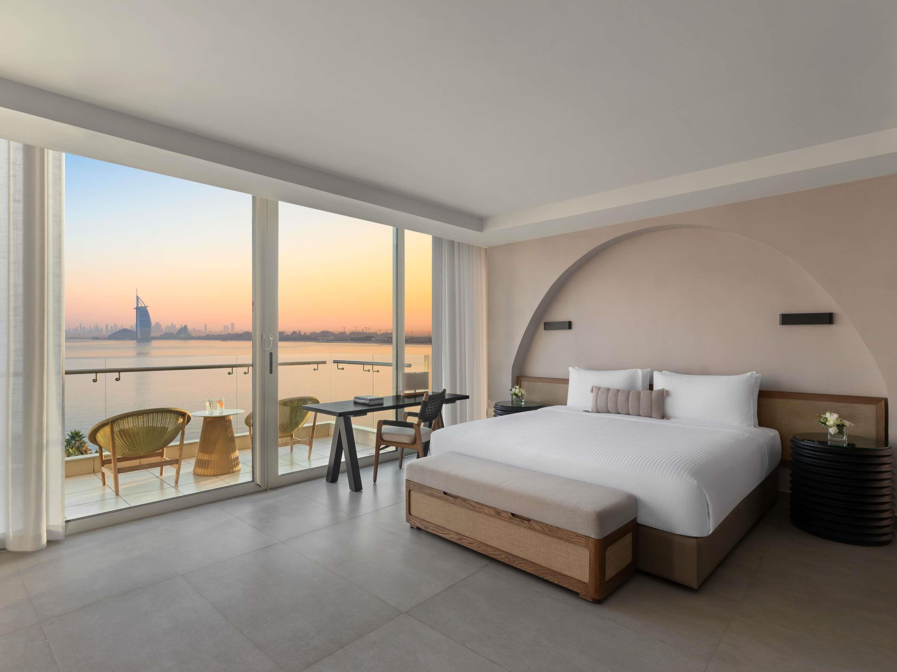 Rixos The Palm - Tap to explore photos
