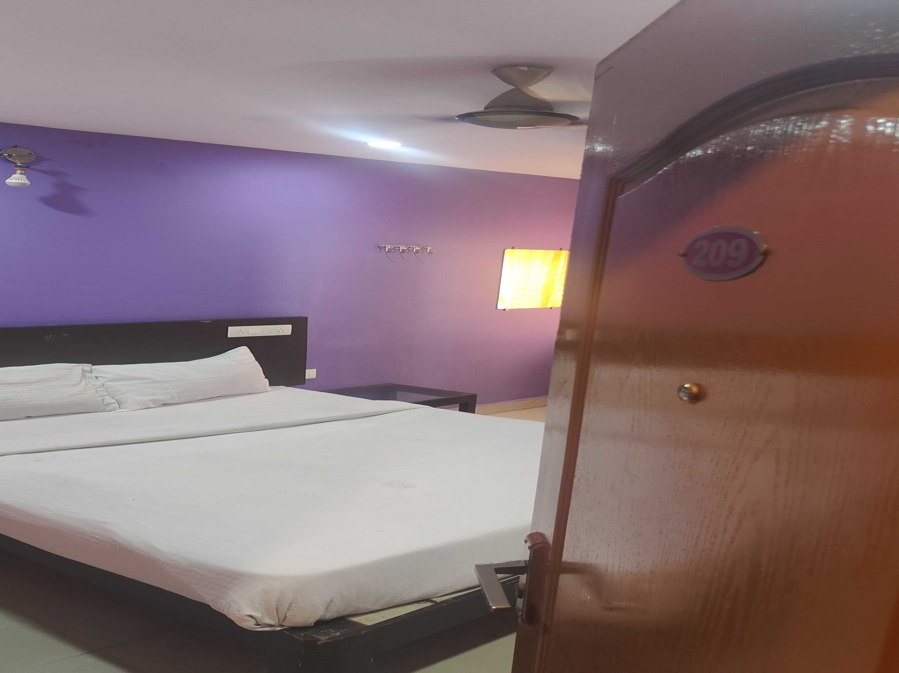 Hotel O Adithya Residency - Tap to explore photos