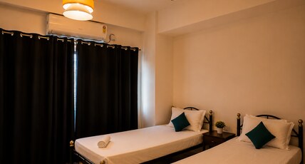 The Sunrise Inn (1.5 km from Guwahati Railway Station) Room Type - Deluxe Twin with City View | AC