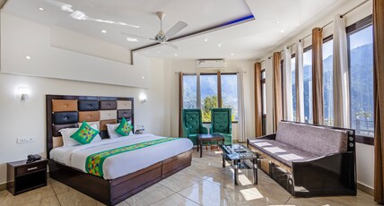 Treebo Anjukul Room Type - Spacious Superior Room with Mountain View