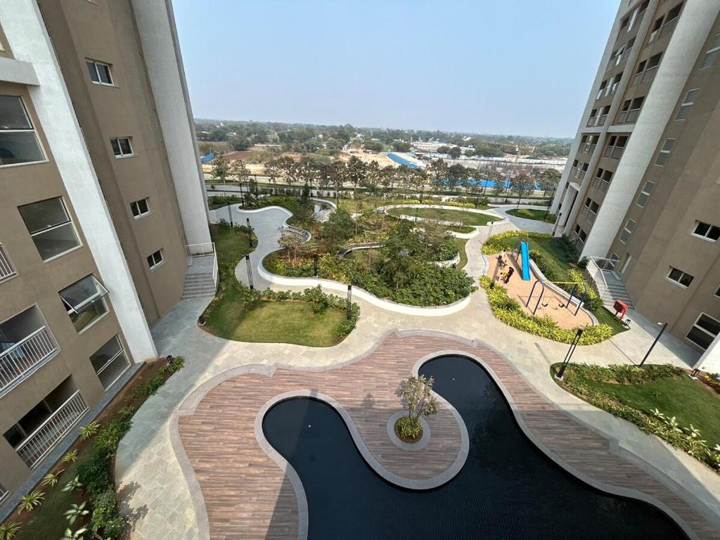 GIFT City Executive 2BHK with Pool, Gym and Free Parking - Tap to explore photos