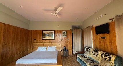 The HIMALAYAN WOODS MMT Room Type - Bedroom 1
