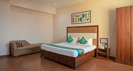 Treebo Golden Leaf DDN Room Type - Spacious Premium Room