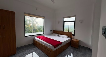POOZHIKUTH RESIDENCY Room Type - Deluxe Family Room POOZHIKUTH RESIDENCY Room Type - Deluxe Family Room