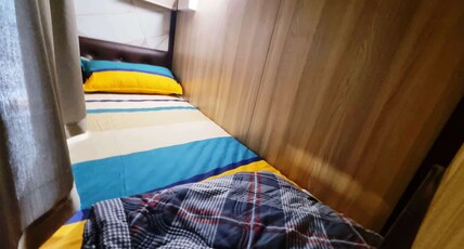 The Plaza Dormitory Kalina Room Type - Deluxe Bed