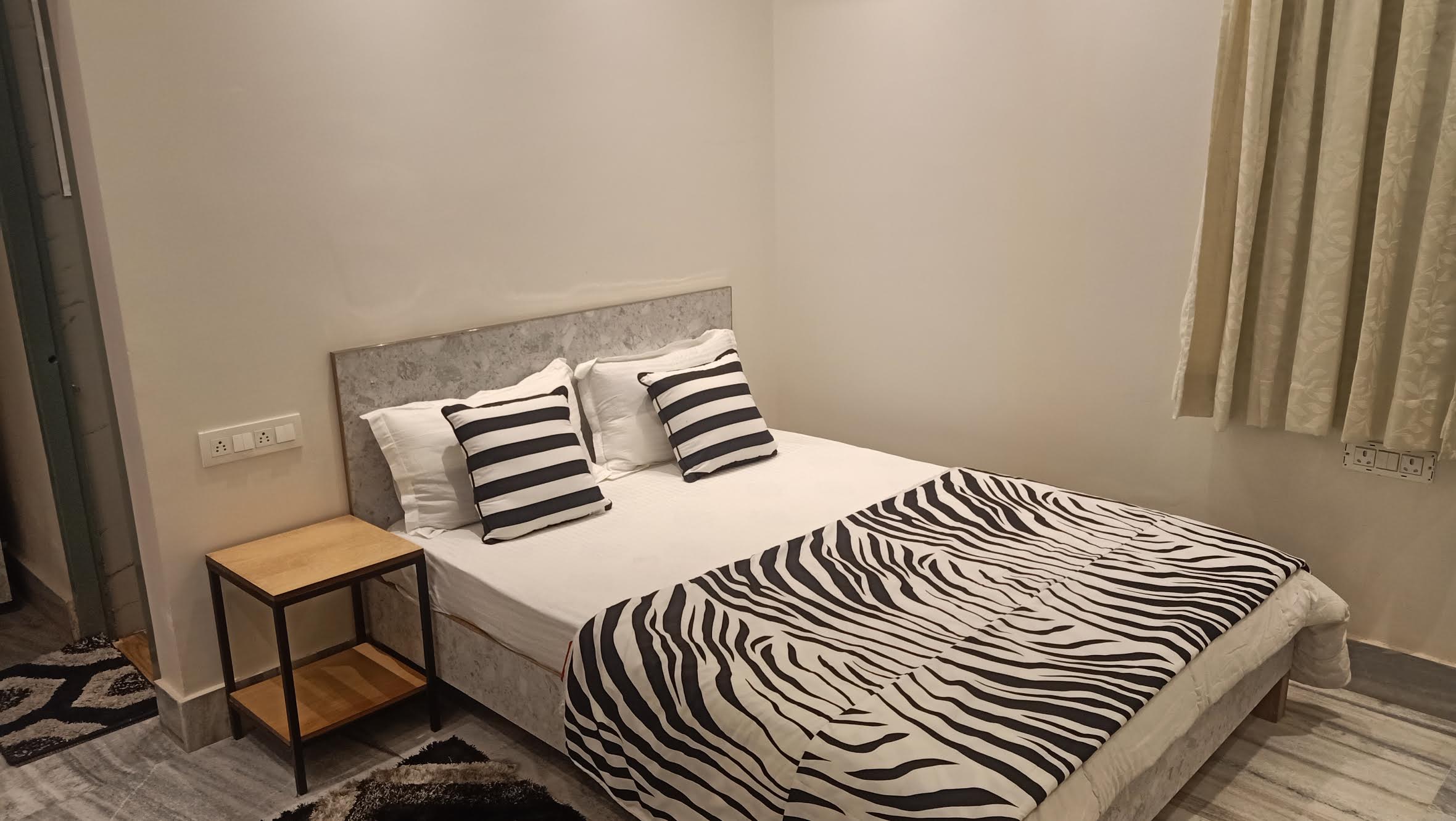 Modern Boutique Room - Tap to explore photos