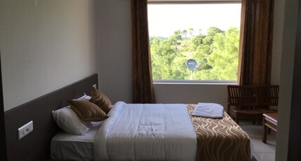 Mansuri Hotel and Restaurant Room Type - Super Deluxe AC