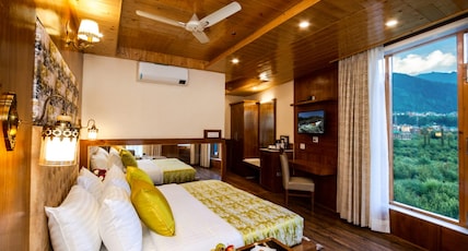 Hotel Suryansh Regency Room Type - Deluxe Room (With Private Balcony and Mountain View) Hotel Suryansh Regency Room Type - Deluxe Room (With Private Balcony and Mountain View)
