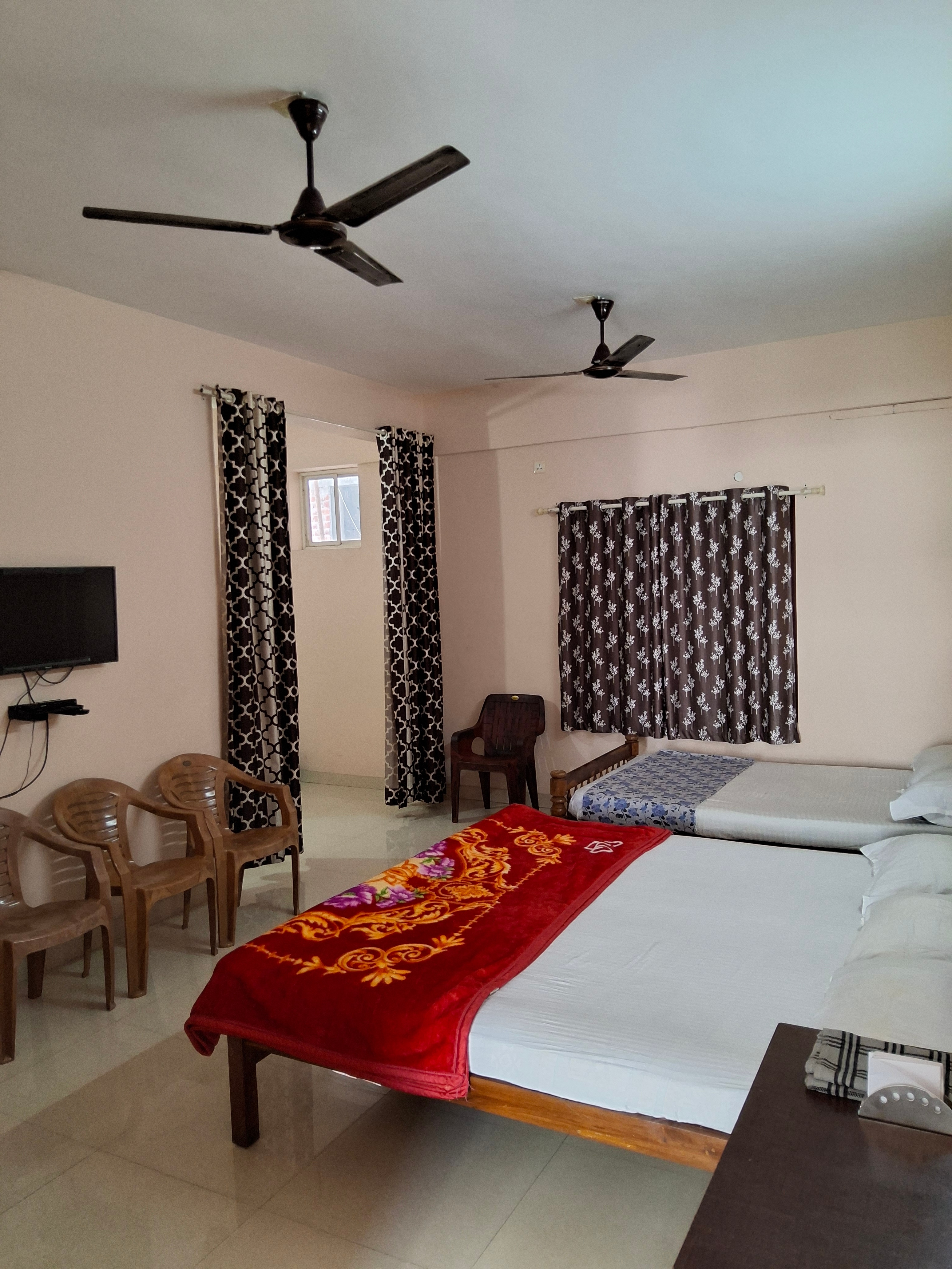 Vidhara Rooms | 5 min drive to KIMSHEALTH Hospital - Tap to explore photos
