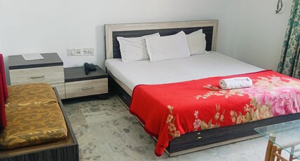 Hotel City centre (Pure Veg) Room Type - Deluxe AC