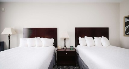 Best Western Sugarland Inn Room Type - 2 Queen Beds, Mobility Accessible, Communication Assistance, Bathtub, Non-Smoking, Full Breakfast Best Western Sugarland Inn Room Type - 2 Queen Beds, Mobility Accessible, Communication Assistance, Bathtub, Non-Smoking, Full Breakfast