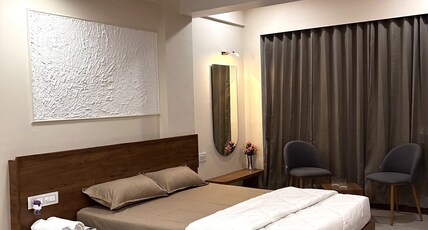 Hotel Krushnkunj Executive ( 700 M From Mahalaxmi Temple ) Room Type - Deluxe Family Room