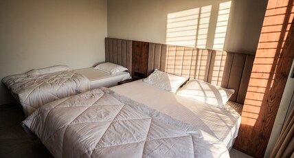 Hotel Shanti Inn Room Type - DELUXE ROOM 3-BED