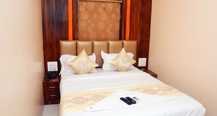 Hotel Nest N Rest Room Type - Deluxe Room