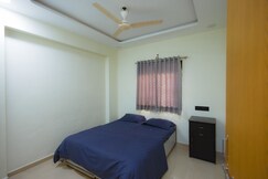 Rooms of Cozy 2BHK Home away from Home Sleek Central