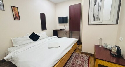 Stay Inn Kailasha | Parking Terrace Kitchen Room Type - Deluxe AC Room