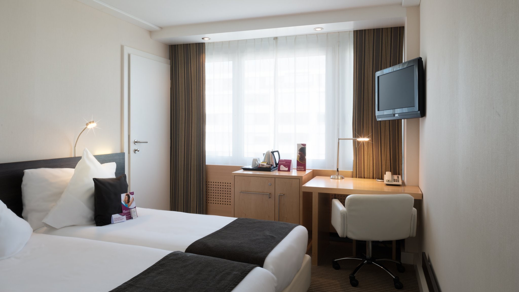 Crowne Plaza Zurich - Tap to explore photos