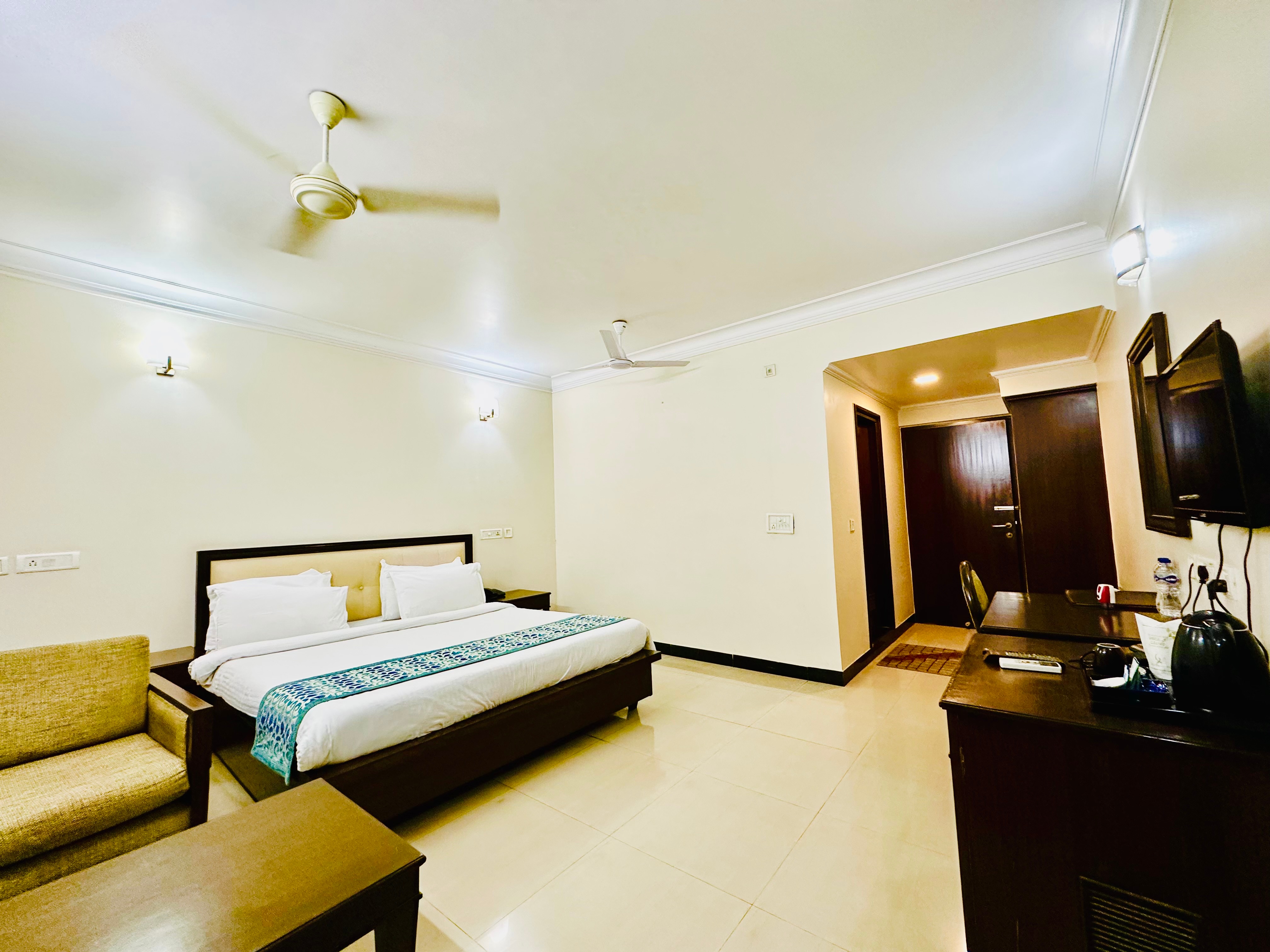 HOTEL YUVRAJ DX - Tap to explore photos