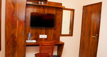 Hotel Nest N Rest Room Type - Deluxe Room