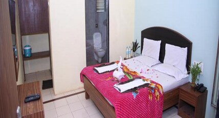 Hotel Royal- Pure Veg Room Type - Deluxe AC Room