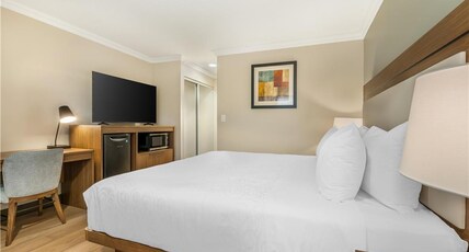 Best Western Plus Burnaby Hotel Room Type - 1 King Bed, Non-Smoking, Sofabed, Work Desk, Refrigerator, In-Room Safe, Full Breakfast Best Western Plus Burnaby Hotel Room Type - 1 King Bed, Non-Smoking, Sofabed, Work Desk, Refrigerator, In-Room Safe, Full Breakfast