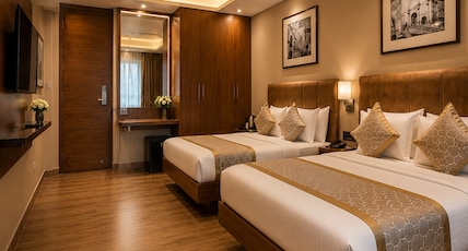 Staybook Hotel Nitya Maharani Room Type - Four Bed Family Room with Window Ideal for 4-5 Adults Staybook Hotel Nitya Maharani Room Type - Four Bed Family Room with Window Ideal for 4-5 Adults