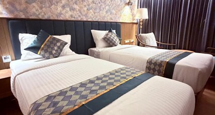 Hosta Inn Hotel And Resort Room Type - Luxury Bedroom with Twin Bed and Private Bathroom Hosta Inn Hotel And Resort Room Type - Luxury Bedroom with Twin Bed and Private Bathroom