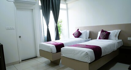 Hotel Flamount Arka Studios Room Type - Twin Bed Studio with Balcony