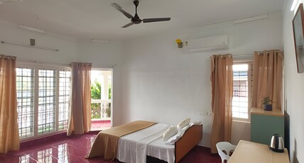 Nature's Nook Homestay Room Type - Deluxe Room with Balcony and Lake View