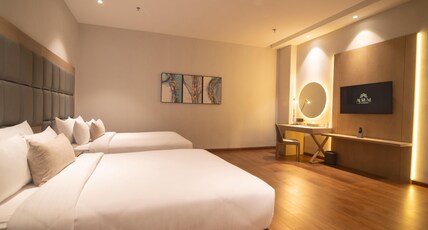 Aurum By RJ Resorts | 5 minutes from Airport | Room Type - KING SUITE WITH BALCONY AND BATHTUB