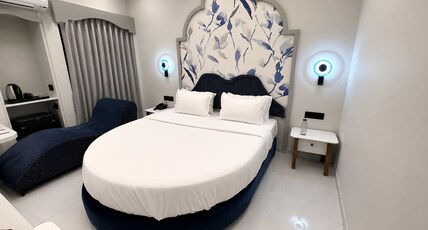 Hotel Nova Bloom Room Type - Premium Round Bed Suite with 245 Sofa and 55 Inch Android Smart T.v for Netflix and Chill Hotel Nova Bloom Room Type - Premium Round Bed Suite with 245 Sofa and 55 Inch Android Smart T.v for Netflix and Chill