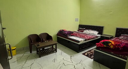 Maheswari Lodge Room Type - Family Room with City View King Bed