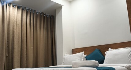HOTEL VATIKA INN Room Type - DELUXE ROOM