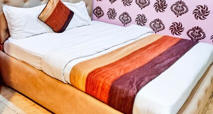 New Ganesha Room Type - Deluxe AC Queen City View